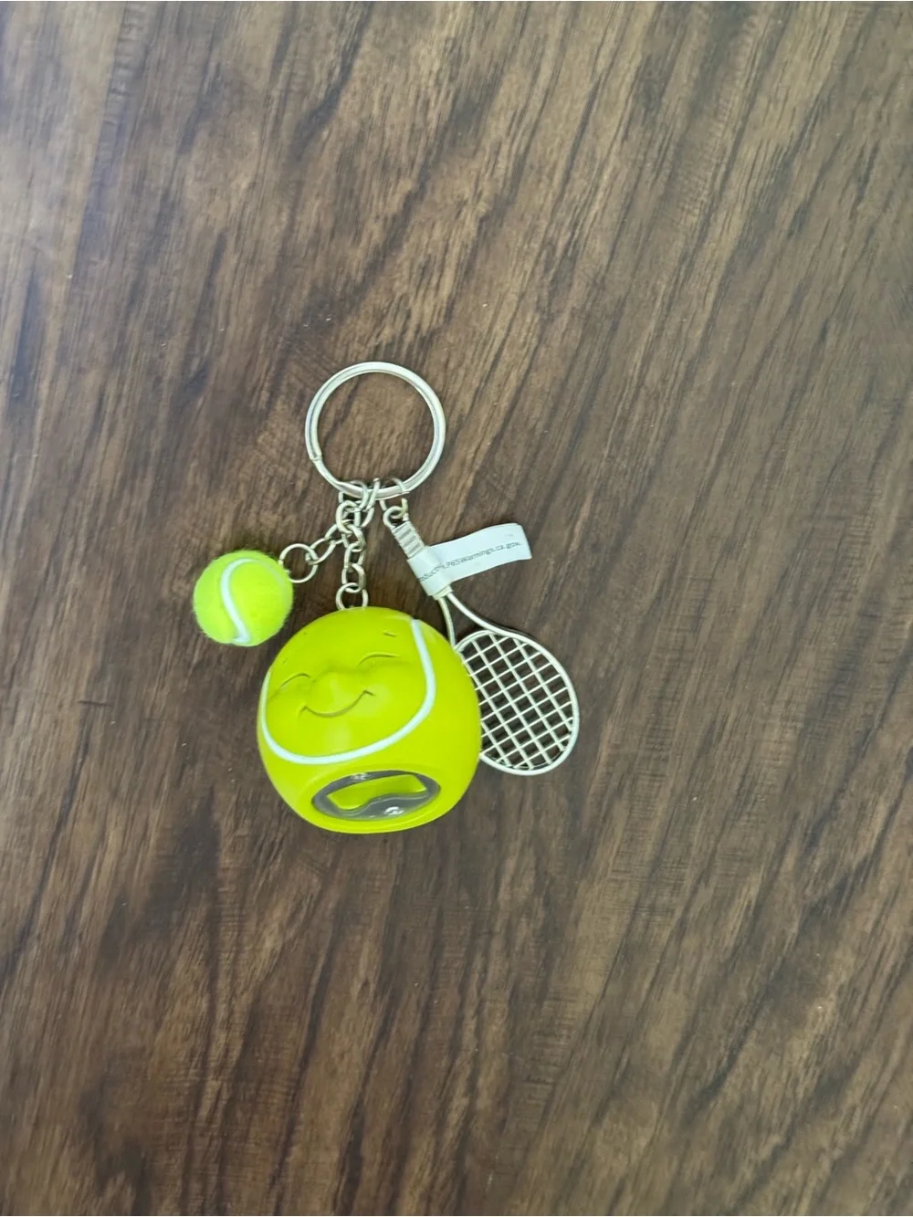 Urban outfitters Tennis Ball & Racket Keychain - Neon Yellow